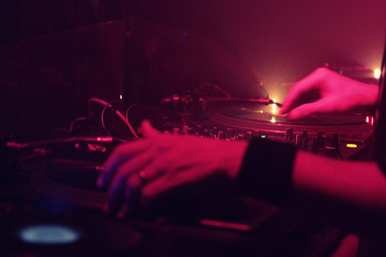 A DJ mixes two vinyl records at the Tresor techno club in Berlin