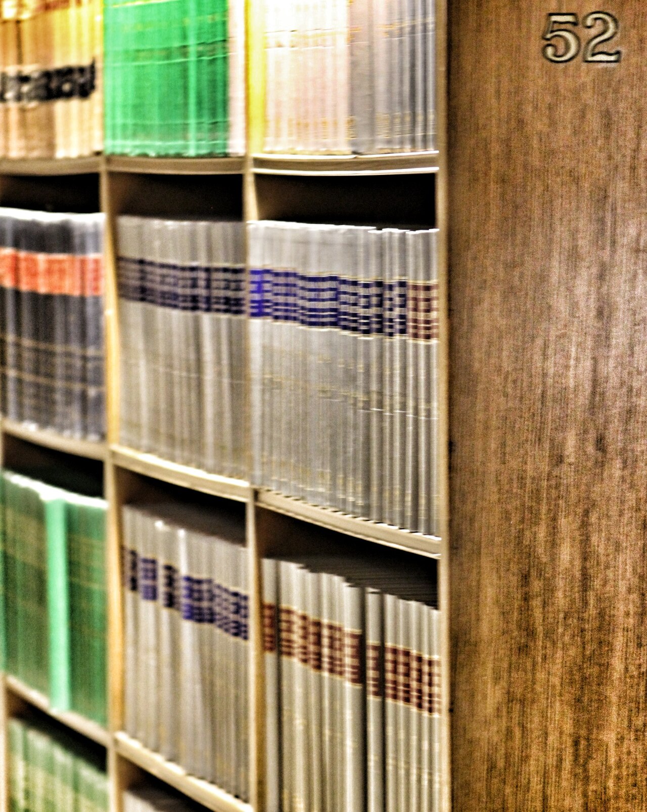 Rows of law books lined up on library shelves